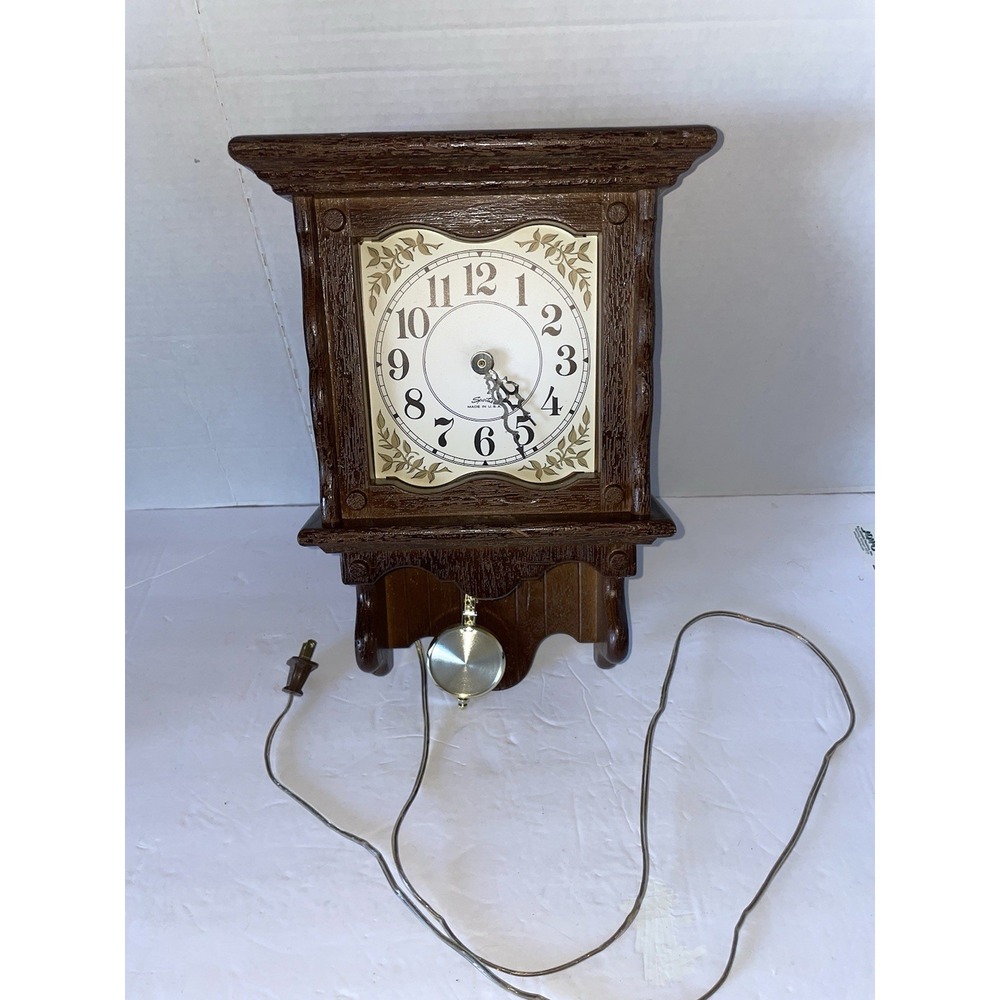 Vintage Spartus Plastic Brown Wall Clock With Pendulum model  6912 Made In USA